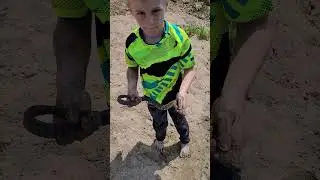 Snake Boy Catches Giant Snake From Water
