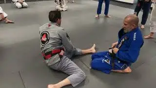 Two on one arm isolation to an unnamed uncomfortable position