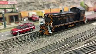 SP NW2 delivers an old Penn Central SD45 to the museum