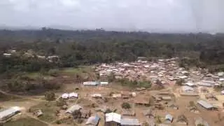 Helicopter ride over remote African village - Gbarpolu, Liberia