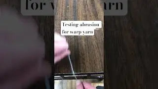 Abrasion test for warp yarn - the table edge mimics abrasion from the reed #weaving #yarns