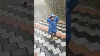 When it rains .... # Rain # baby # girl # love # cute # kerala # funny #happy