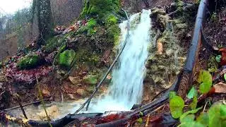 Water stream falls over rocks