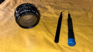 Disassembling and repairing a stuck aperture ring of a SMC Pentax-A 50m f/1.7