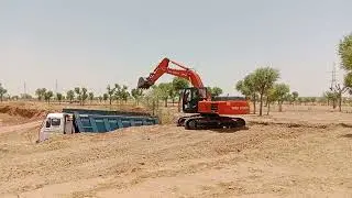 Efficiency Secrets: Loading a Dump Truck with an Excavator