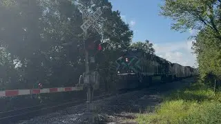 FEC mixed freight 204 rockets NB through Bunnell, FL with 430 in trail. 7/24/25