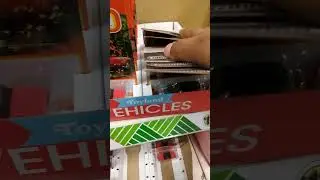 Looking at some shelves of Matchbox cars! (at Dollar Tree)
