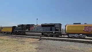 Union Pacific WP heritage unit #1983 idiling behind BB4014 in Ogden Utah. (LF)