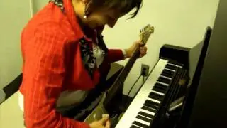 Maria playing two instruments at once with her mouth 