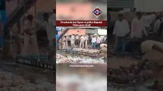Passersby loot alcohol bottles in police presence in Andhra Pradesh