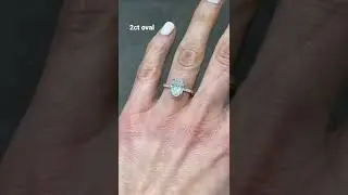 2 carat oval diamond engagement with pave set shoulders