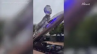 Fans Deliver Large Elon Musk Statue to Tesla Headquarters in 'Goatsgiving' Event