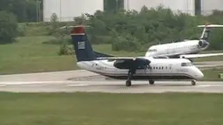 US Airways Express Dash 8-300 Twin Turbo Prop taking off Charlotte Douglas Intl Airport