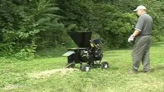 A Mighty Mac 12P Shredder Chipper processes bamboo