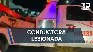 Mujer resulta lesionada tras accidente entre gr&uacute;a y coche en Puebla