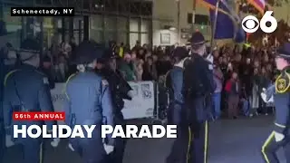 Schenectady's 56th Annual Holiday Parade with floats, music, and Santa Claus