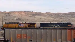 UNION PACIFIC & SOUTHERN PACIFIC diesels lead coal empties to Powder river basin mines