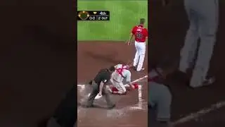 Chipper Jones trucks the Phillies catcher