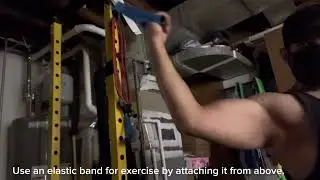 Using resistance bands for bicep exercises from the basement