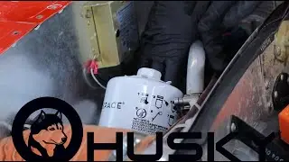 Husky Oil Change at the Aviat Aircraft Factory