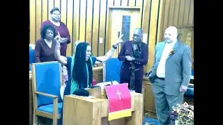Dr. Telika McCoy preaching, 