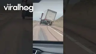 Strong Winds Lift Semi Truck Driving on the Highway || ViralHog