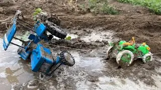 big tractor got stuck in mud | pulled out with the help of small tractor |