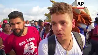 Cuban students and workers march in Havana to mark May Day