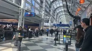 Man with gun arrested after running into terminal area at O'Hare Airport, officials say