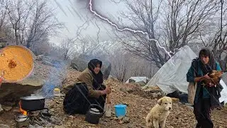The life of Iranian nomadic women on a rainy day in the mountains | Rain, Fire, and Survival🌧🔥