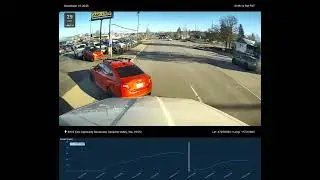 Small car almost gets hit by semi going into car lot #semi  #test #testdrive #baddrivers #shortvideo