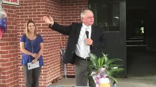 Former principal bids 