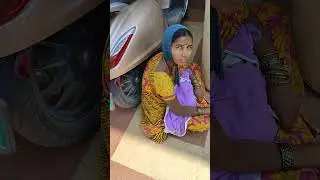 Begging scandal and also  she is holding a baby who is 1 year old. #stopchildabuse