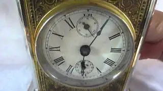 Antique musical carriage clock
