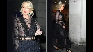 Bleary eyed Lydia Bright accidentally flashes her nipple as she leaves an awards show in London