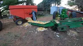 Filling the corn crib with John Deere equipment