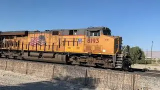 Union Pacific ES44AH 8193 and ET44AH 2711 eastbound through Amtrak Palms Springs-North Station