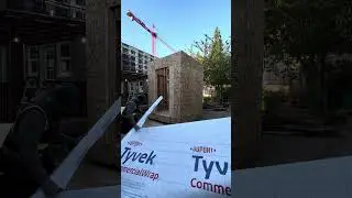 Preparing tyvek commercial wrap for the mockup here in shoreline