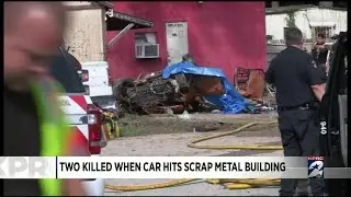 Two killed when car hits scrap metal building
