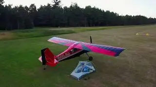 American Champion Scout Landing in the Woods