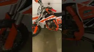 Clean Ktm 105 supermini graphics from backyard design
