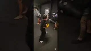 Warming up with the other kids before pad work with uncle. 