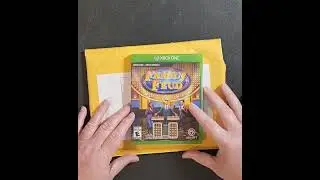 Delivery - Opening a package from Game Stop - Family Feud