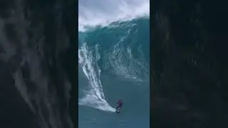Kai Lenny riding a massive wave on a kiteboard #shorts