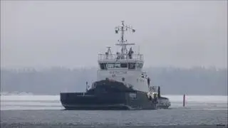 Icebreaker Protector and RMS Neudorf in Kyrönsalmi Strait