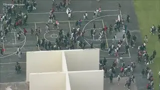 Students at a Florida high school walk out in protest of transgender athlete investigation
