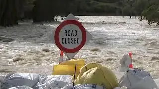 Floods force thousands to evacuate in New Zealand after metre of rain