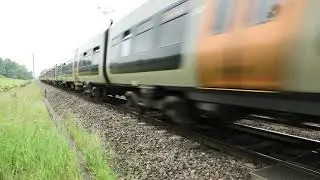 A class 323 electric train thundering down the Lickey incline.
