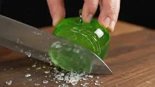 Knife Slices Glowing Glass Apple