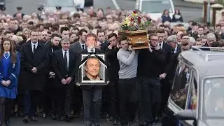 Ce matin : fun&eacute;railles de Roland Giraud en France, longues files de personnes lui disent au revoir.